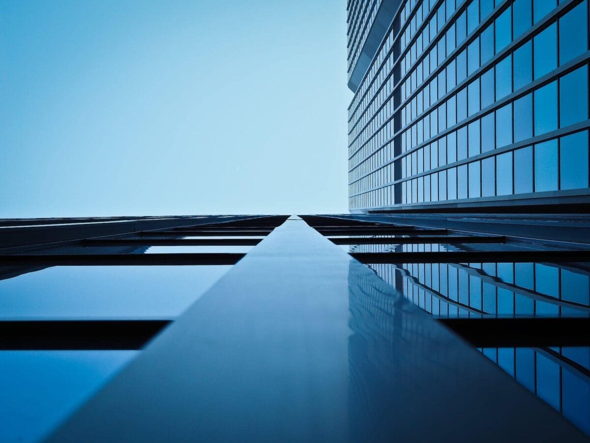 low angle view of office building against clear sky