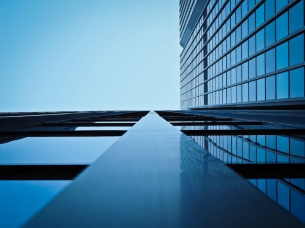 low angle view of office building against clear sky