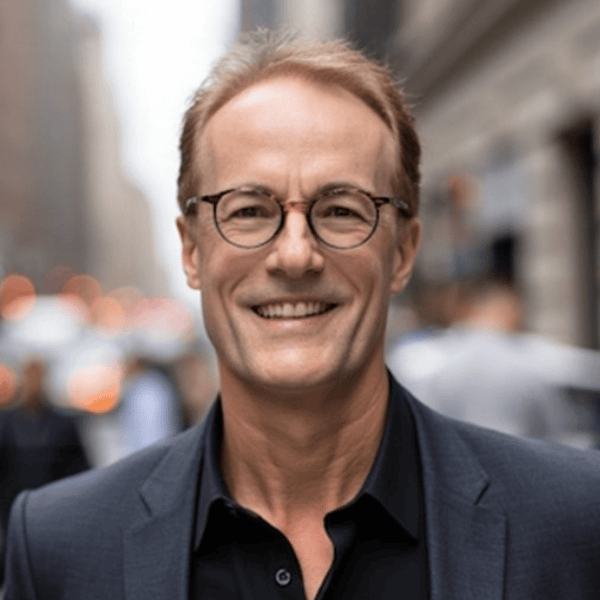 Headshot of Andrew Busch for the 2025 PLUS Conference