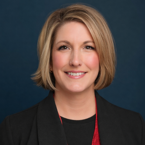 Headshot of Nikki Baker of the PLUS Foundation