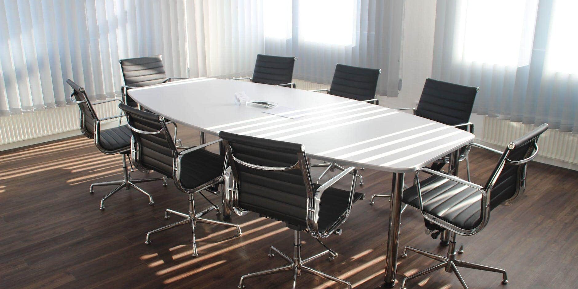 white wooden table with chairs set